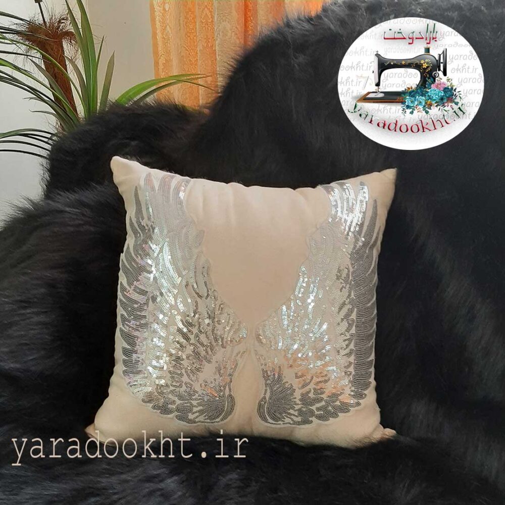 کوسن مخمل کرم بال فرشته نقره ای